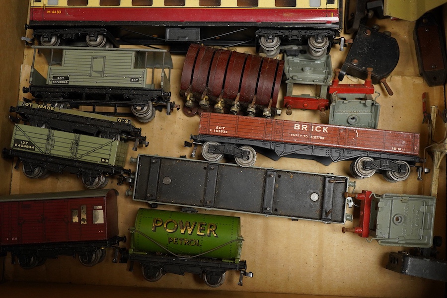 A collection of Hornby Dublo for 3-rail running, including two locomotives; a BR Duchess of Montrose, and a BR Standard Class 4MT 2-6-4T, together with four carmine and cream bogie coaches, nine freight wagons, a signal